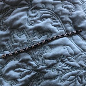 Blue topaz and silver tone bracelet